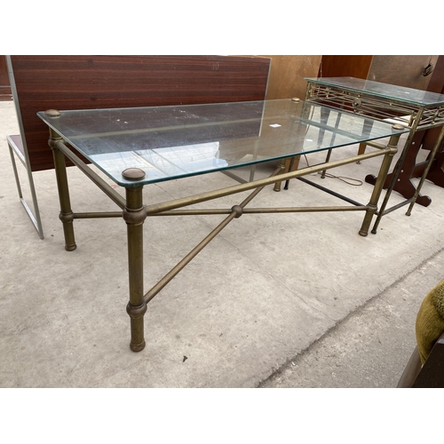 2751 - A GLASS TOP COFFEE TABLE ON METAL WARE BASE, 44 X 22