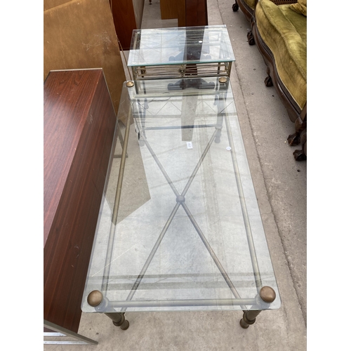 2751 - A GLASS TOP COFFEE TABLE ON METAL WARE BASE, 44 X 22