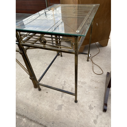 2751 - A GLASS TOP COFFEE TABLE ON METAL WARE BASE, 44 X 22