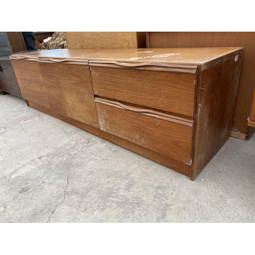 2762 - A RETRO TEAK SIDEBOARD ENCLOSING TWO CUPBOARDS AND TWO DRAWERS, 71