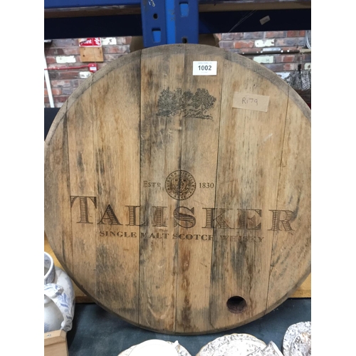 1002 - A LARGE WOODEN ROUND TALISKER SCOTCH WHISKY SIGN DIAMETER 55CM