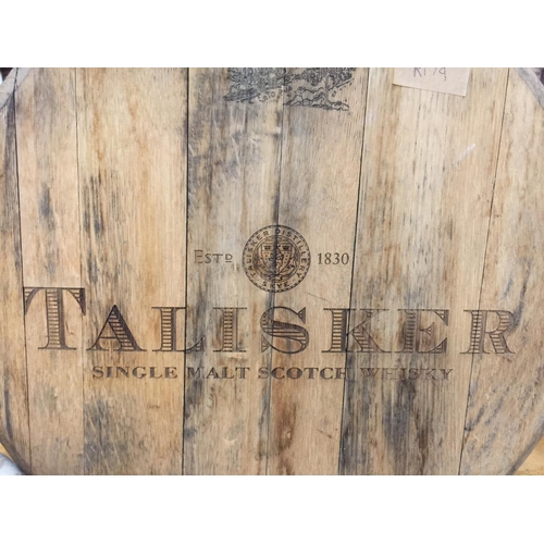 1002 - A LARGE WOODEN ROUND TALISKER SCOTCH WHISKY SIGN DIAMETER 55CM