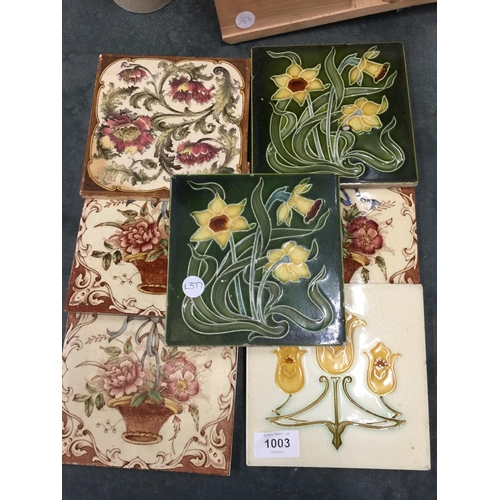 1003 - SEVEN VINTAGE WALL TILES, THREE WITH TUBE LINING FLOWERS