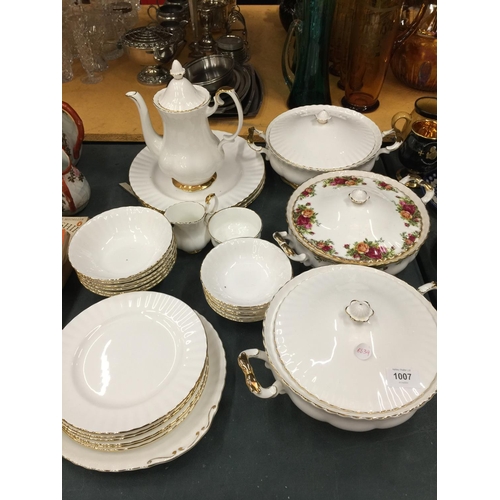 1007 - A QUANTITY OF ROYAL ALBERT 'VAL D'OR' DINNERWARE TO INCLUDE PLATES, LIDDED SERVING DISHES, A COFFEE ... 