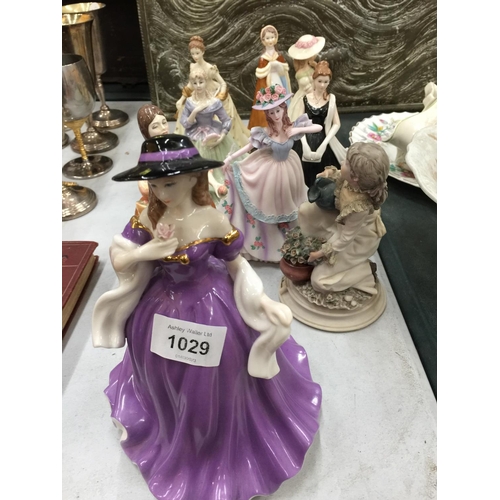 1029 - NINE VARIOUS LADY FIGURINES