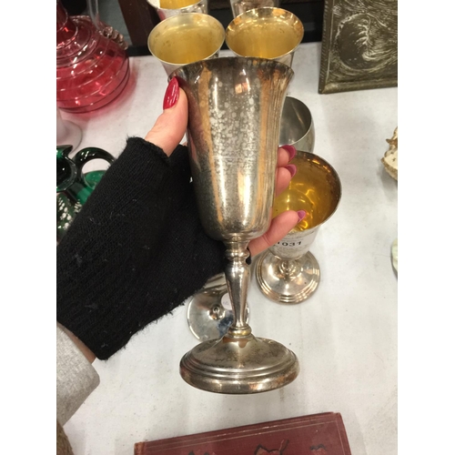 1031 - EIGHT SILVER PLATED WINE GOBLETS - 1 A/F