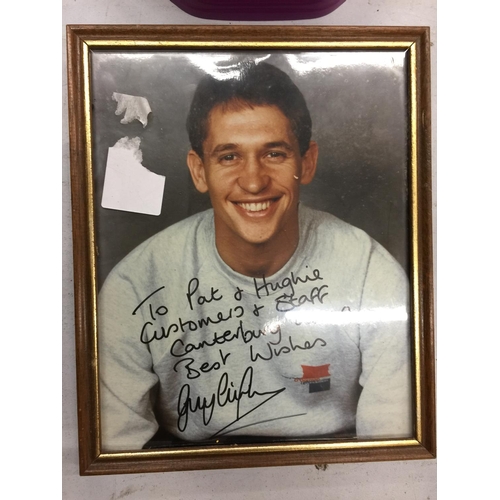 1046 - TWO FRAMED SIGNED PHOTOGRAPHS OF GARY LINEKER AND FRANK BRUNO