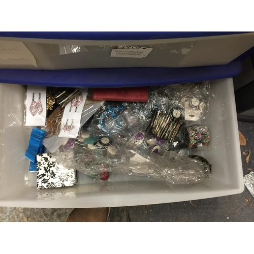 1054 - A VERY LARGE AMOUNT OF COSTUME JEWELLERY IN THREE PLASTIC DRAWERS TO INCLUDE NECKLACES, BANGLES, BRA... 