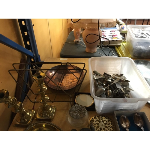 1067 - A LARGE MIXED LOT TO INCLUDE FLATWARE, A COPPER DISH, CARRIAGE CLOCK, BRASS CANDLESTICKS AND BOWLS, ... 