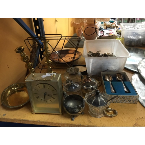 1067 - A LARGE MIXED LOT TO INCLUDE FLATWARE, A COPPER DISH, CARRIAGE CLOCK, BRASS CANDLESTICKS AND BOWLS, ... 