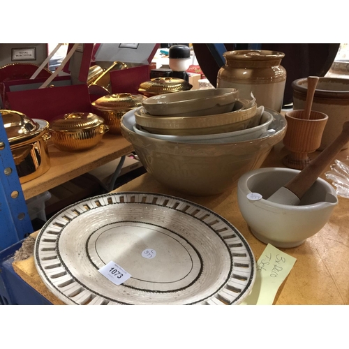 1073 - A QUANTITY OF STONEWARE ITEMS TO INCLUDE MIXING BOWLS, A PESTLE AND MORTAR, STORAGE JAR, LARGE JUG, ... 