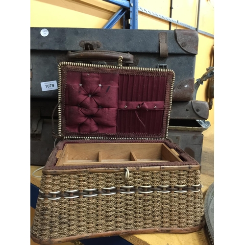 1079 - TWO VINTAGE SUITCASES PLUS A WICKER SEWING BASKET