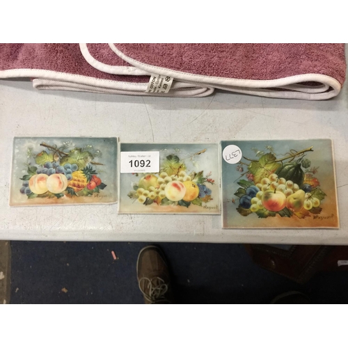 1092 - THREE SMALL HANDPAINTED SIGNED CERAMIC PLAQUES