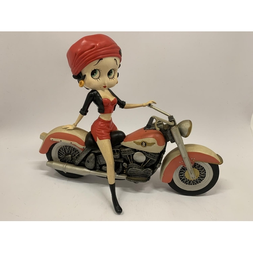 110 - A BETTY BOOP ON A MOTORBIKE MODEL HEIGHT 24CM, LENGTH 30CM