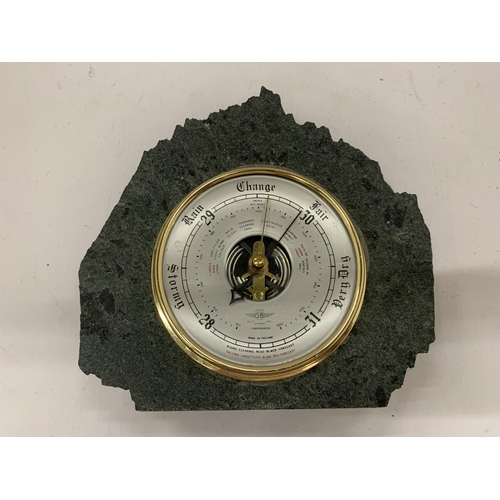 140 - A SLATE AND BRASS BAROMETER