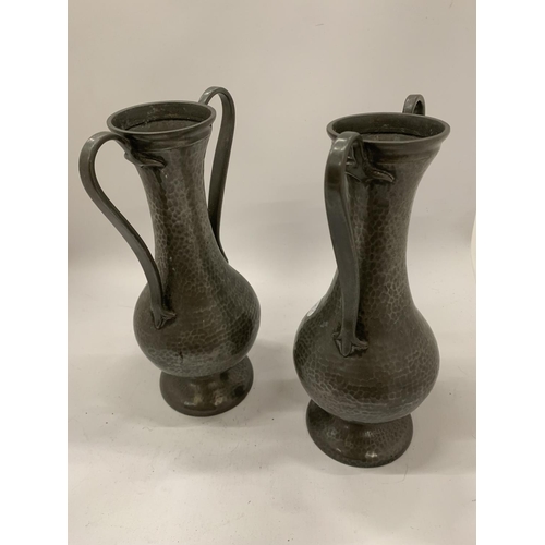 141 - A PAIR OF ARTS AND CRAFTS STYLE PEWTER VASES