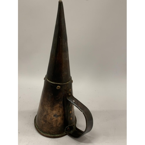 143 - A VINTAGE COPPER CONICAL ALE MULLER HEIGHT 30CM