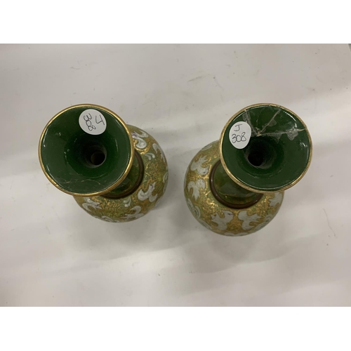 149 - A PAIR OF ROYAL DOULTON VASES WITH SLIM NECKS AND GREEN PATTERN - BOTH A/F