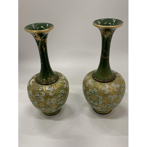 149 - A PAIR OF ROYAL DOULTON VASES WITH SLIM NECKS AND GREEN PATTERN - BOTH A/F