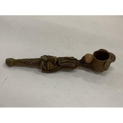 164 - A WOODEN TRIBAL STYLE PIPE