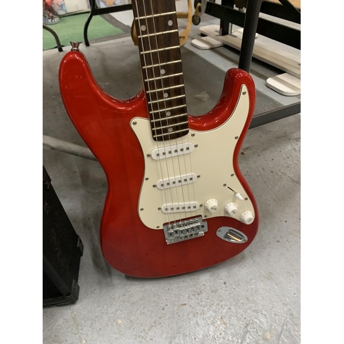 175 - A 'GEAR4MUSIC' RED ELECTRIC GUITAR & A STAGG ELECTRIC AMPLIFIER