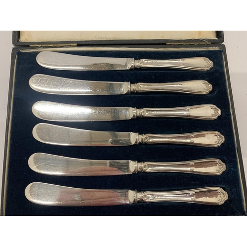 20 - A CASED SET OF SIX HALLMARKED SILVER HANDLED BUTTER KNIVES