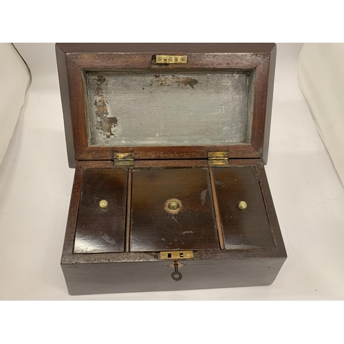 211 - AN INLAID MAHOGANY TEA CADDY WITH THREE COMPARTMENTS