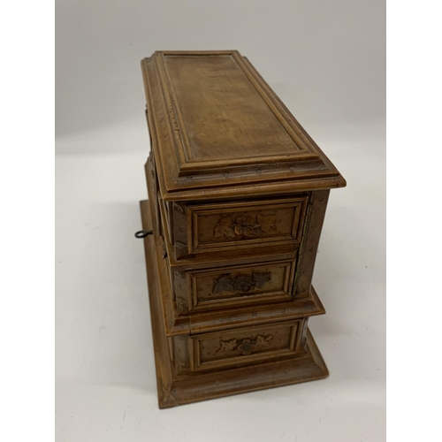 25 - A CARVED SATINWOOD TABLE TOP SEWING CABINET WITH LIFT UP LID AND INNER DRAWERS, HEIGHT 17CM