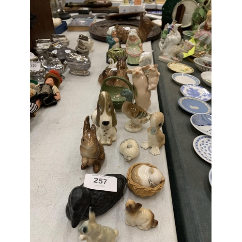 257 - A QUANTITY OF CERAMIC ANIMAL FIGURES TO INCLUDE RABBITS, CATS, DUCKS, A HORSE, GOAT, ETC PLUS TWO AR... 