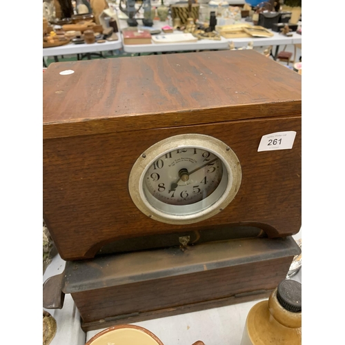 261 - A VINTAGE 'BLICK TIME RECORDERS' CLOCKING IN CLOCK IN A MAHOGANY CASE