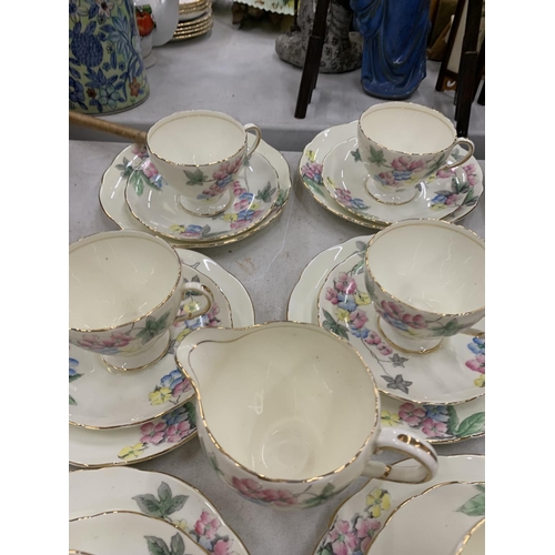 267 - A VINTAGE OLD FOLEY TEASET DECORATED WITH A FLORAL PATTERN TO INCLUDE CUPS, SAUCERS, SIDE PLATES, A ... 