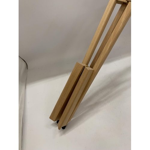 275 - A WOODEN ADJUSTABLE EASEL