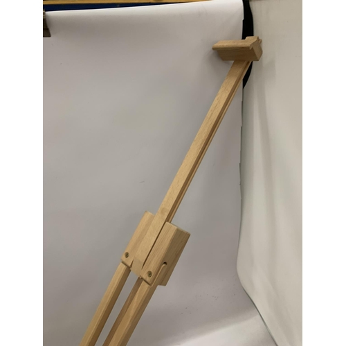 275 - A WOODEN ADJUSTABLE EASEL