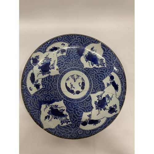 287 - AN ORIENTAL BLUE AND WHITE CHARGER - A/F DIAMETER 36CM