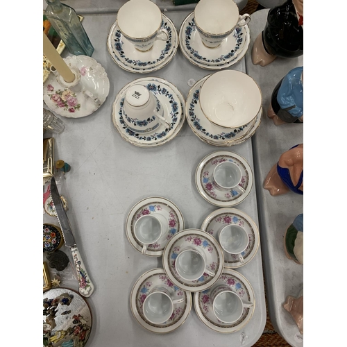 291 - A QUANTITY OF CHINA CUPS AND SAUCERS PLUS A SUGAR BOWL