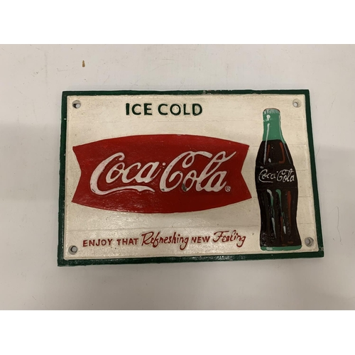 293 - A CAST 'ICE COLD COCA-COLA' SIGN 29CM X 20CM