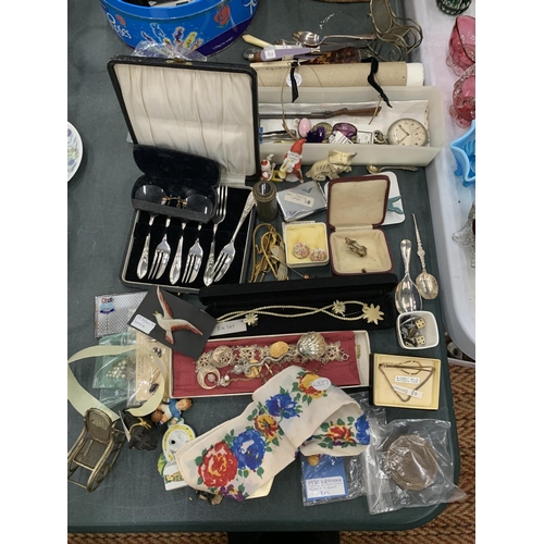 297 - A LARGE MIXED LOT TO INCLUDE COSTUME JEWELLERY, FIGURES, FLATWARE, AN ART DECO CARD CASE, ETC