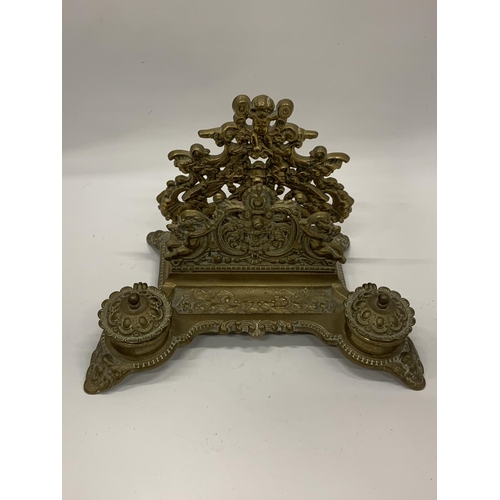 35 - A DECORATIVE BRASS INKSTAND