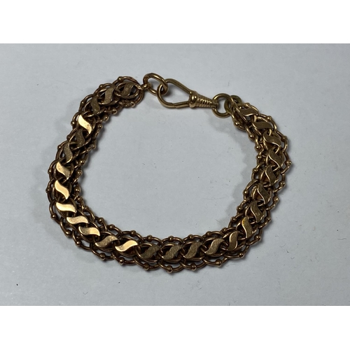 504 - A TESTED 9CT YELLOW GOLD FANCY LINK BRACELET, WEIGHT 10.10G