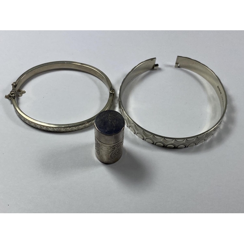 518 - THREE HALLMARKED SILVER ITEMS TO INCLUDE TWO BANGLES AND A LIDDED PILL BOX