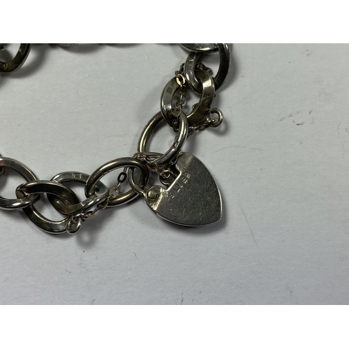 523 - A HALLMARKED SILVER HEART PADLOCK BRACELET