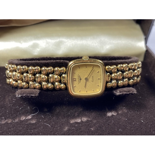 634 - A BOXED LADIES LONGINES GOLD PLATED WATCH WITH PURCHASE RECEIPT