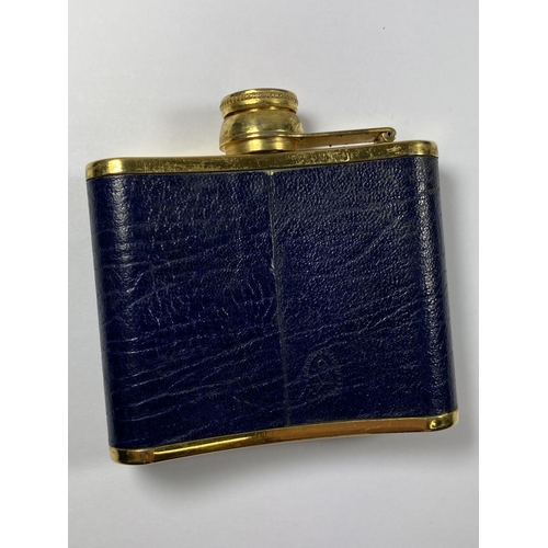 658 - A VINTAGE GOLD PLATED AND BLUE LEATHER HIP FLASK