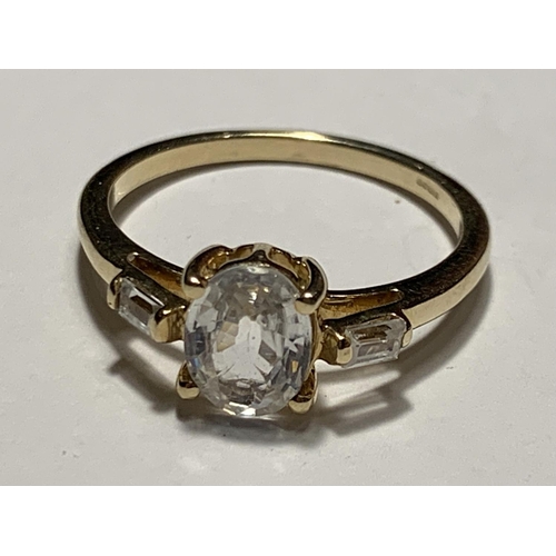 676 - A 9 CARAT GOLD RING WITH A WHITE SAPPHIRE SIZE N/O