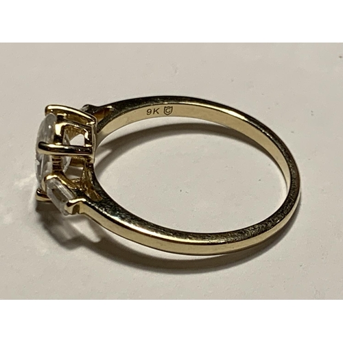 676 - A 9 CARAT GOLD RING WITH A WHITE SAPPHIRE SIZE N/O