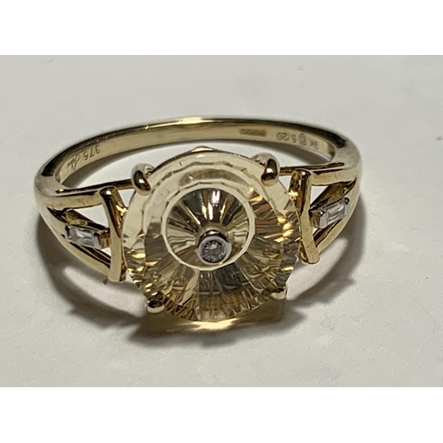 680 - A 9 CARAT GOLD RING WITH THREE DIAMONDS SIZE O