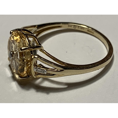 680 - A 9 CARAT GOLD RING WITH THREE DIAMONDS SIZE O