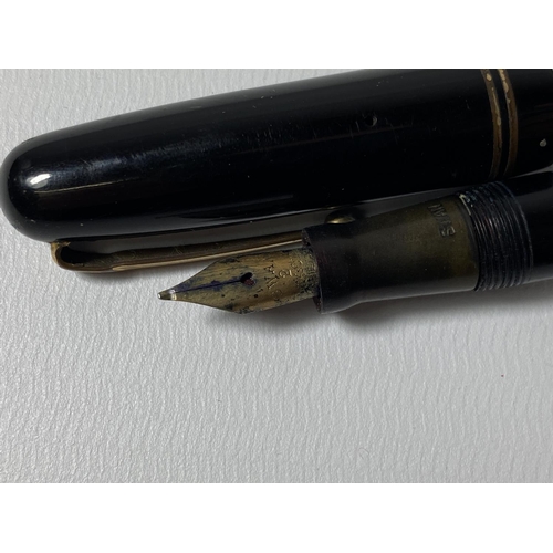 691 - A VINTAGE SWAN FOUNTAIN PEN WITH 14CT YELLOW GOLD NIB