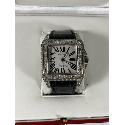 698 - A BOXED GENTS CARTIER SANTOS AUTOMATIC WATCH WITH DIAMOND SET DIAL, WORKING AT TIME OF CATALOGING