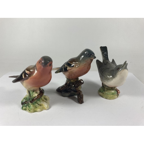 714 - A GROUP OF THREE BESWICK BIRDS